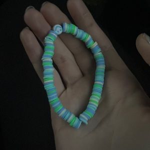 Blue, green, and purple bracelet
